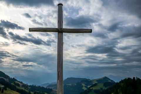 Wooden cross and storm clouds, Rigi Staffel, Arth, Switzerland