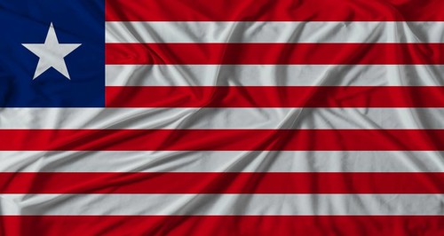 Liberia flag with fabric texture background. National flag of Liberia with cloth texture