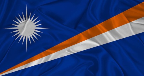 Marshallese flag with fabric texture. Realistic flag of Marshall Islands waving, National flag