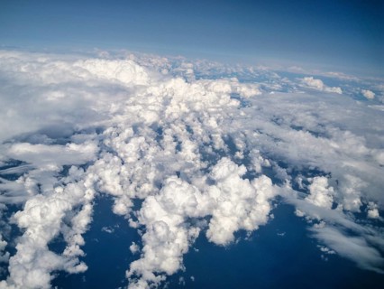 Aerial view from airplane on clouds, Cumulus, Stratocumulus, Edinburgh, Scotland, United Kingdom