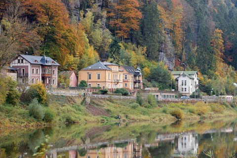 Houses on the banks of the Elbe in autumn, Hrensko or Herrnskretschen, Ustecky kraj, Czech Republic
