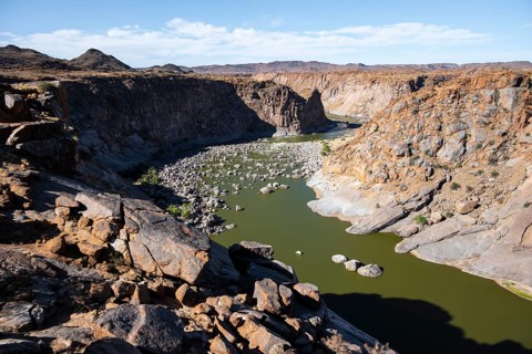 River bed and dump on the Orange River, Augrabies Falls National Park, Northern Cape, South Africa