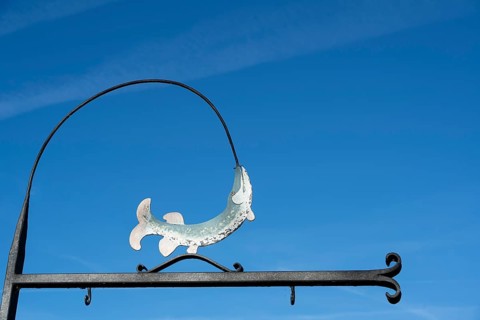 Nose sign with fish figure, Fraueninsel, Chiemsee, Upper Bavaria, Bavaria, Germany