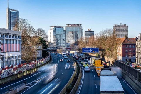 The A40 motorway, Ruhrschnellweg, in Essen, city skyline, Evonik office building, traffic jam in