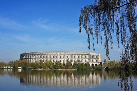 General view of the former incomplete Congress Hall of the NSDAP 1933-1945, in front the bun pond