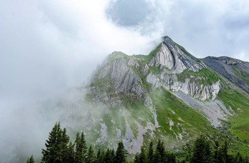 Dramatic mountain landscape with clouds, Ars mountain summit, near Suls-Lobhornhütte, Bernese Alps,