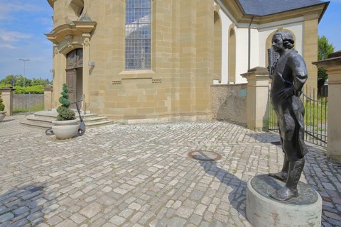 Monument to Baroque builder and architect Balthasar Neumann at the Kreuzkapelle, black bronze