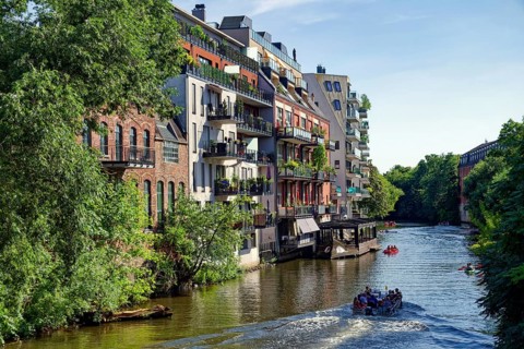 Renovated industrial building, now used as residential building and residential buildings, new