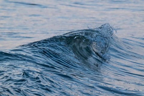 Breaking wave, splashing seawater, Houvig Beach, North Sea, Denmark