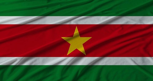 Suriname flag waving. Flag of Suriname with cloth texture
