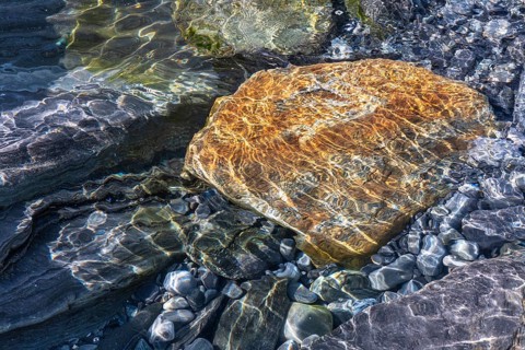 Rocks and stones in the Barents Sea, Söröya, Finnmark, Norway, May 2019