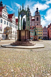 Market square with town hall, town and parish church of St. Marien, Luther monument by Johann