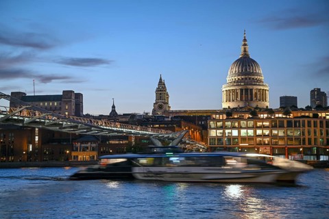 Millennium Bridge, blue hour, shipping traffic, in the background St Paul's Cathedral, London,