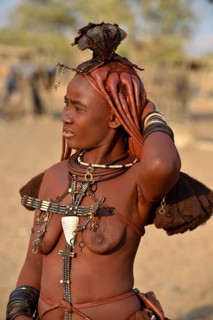 Portrait of a young, married Himba woman