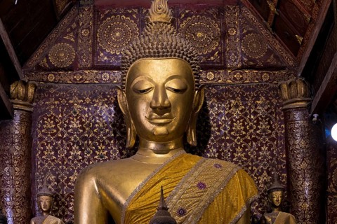 Buddha statue in Wat Xieng Tong or Vat Xienthong, Thong, Luang Prabang, Luang Prabang Province,