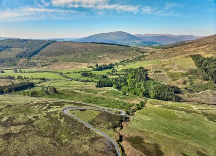 Aerial photo of the highlands near Dalochalloch in Scotland, UK
