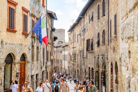 Old Town with stone arches and historic buildings of San Gimignano, Tuscany, UNESCO World Heritage,
