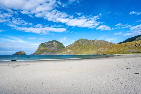Haukland white sandy beach and green mountains, Vestvågøya, Lofoten, Nordland, Norway