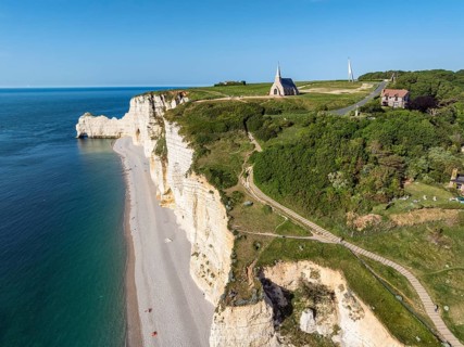 Aerial view of Falaise d'Amont cliffs, Porte d'Amont rock gate on the left, Notre Dame de la Garde