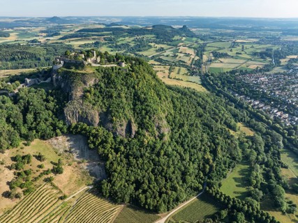 Aerial view of the Hohentwiel volcanic cone with Germany's largest fortress ruin, in the morning