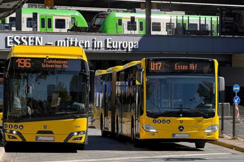 Buses operated by Essener Verkehrsbetriebe and regional trains at the main train station, Essen,