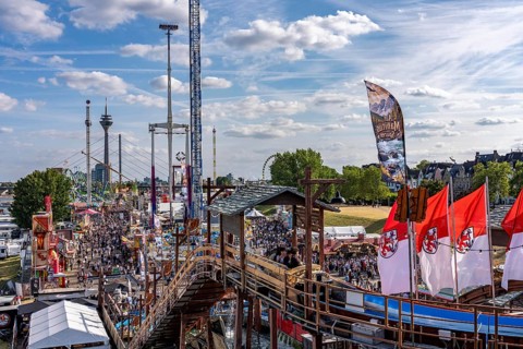 Rhine fair in the Rheinwiesen in Düsseldorf-Oberkassel, view towards the Rhine Tower,