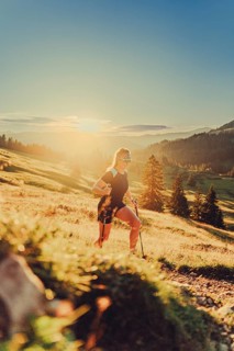 Summer trail running and hiking in the Alps on the Riedberg Pass between Obermaiselstein and