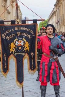 Participants wearing historical costumes on parade, Noto, Noto Valley, Sicily, Italy