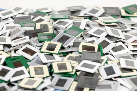 A disorderly pile of slides in different colors