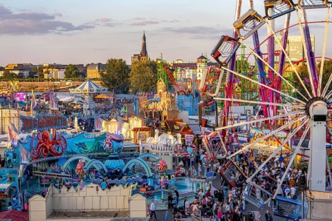 Rhine fair in the Rheinwiesen in Düsseldorf-Oberkassel, view towards the banks of the old town,