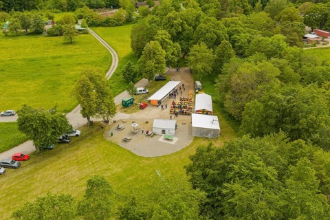 Assembly in a wooded area with tents and people, Father's Day, Forest Festival, Aidlingen,