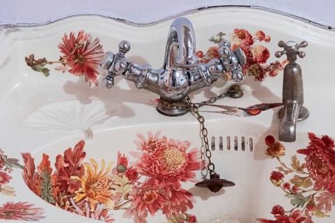 Old sink with silver faucet and floral motifs on sink, Shimla, Himachal Pradesh, North India, India