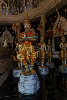 Figures as heavenly beings and temple guards in the public prayer hall in the Buddhist temple