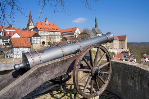 The Fügeler cannon on the castle rondel with panoramic view over medieval town of Warburg