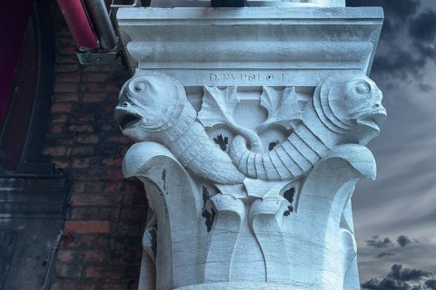 Chapter design on the pillars of the fish market, Rialto market in the San Polo district, Venice,