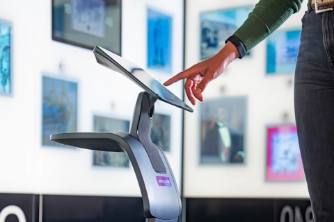 Interaction with an interactive display in a technological exhibition, museum robot Robolutions,