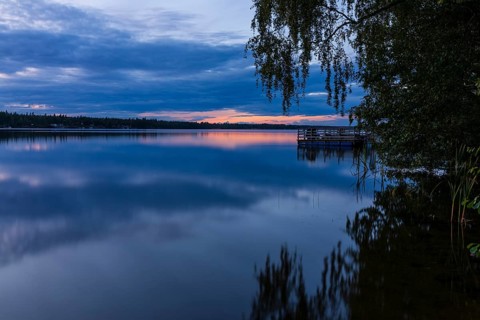 Quiet evening mood at the lake at sunset on Lake Hinden near Värnamo, Jönköpings län, Sweden