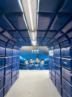 Buenos Aires subway pedestrian tunnel simulates a player tunnel with Argentinean national players