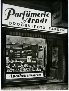 Drugstore store, night, Berlin, Mitte, Seydelstr. 31, illuminated shop window of a perfumery with