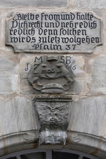 Slogan and relief of a baker's sign from 1766, above an entrance door, Obere Wehd 2, Altdorf,
