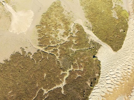 Sandy drifts at low tide at the Lago de la Gaviota (lake of the seagull). Aerial view. Drone shot.
