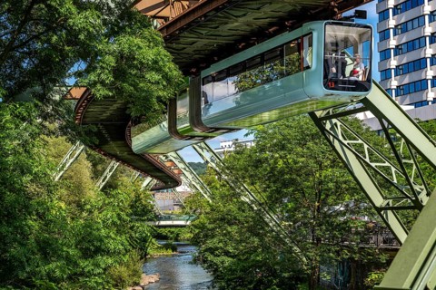 The Wuppertal suspension railway runs above along the Wupper River, between the central railway