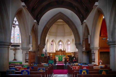 Interior view of choir room, altar, seat cushions, All Saints Church, Marazion, Cornwall, England,