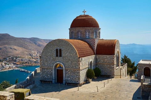 Agiou Sarvas monastery, Agion Pandon church, simple stone church with dome, with sea and mountain