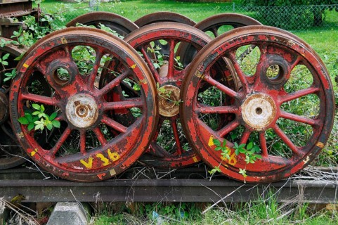 Discarded steam locomotive wheels on an overgrown siding, Ebermannstadt, Upper Franconia, Germany