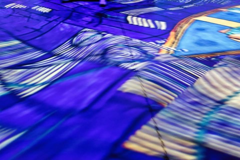 Immersive exhibition, digital art, famous paintings, colorful projections on walls and floors,