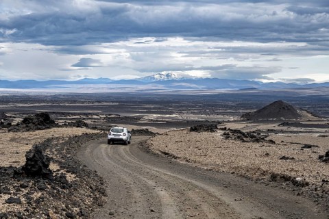 Car on a dirt road, volcanic landscape, barren landscape, Vatnajökull National Park, Icelandic
