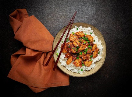 Fried chicken teriyaki with rice, green onion and sesame, homemade, no people