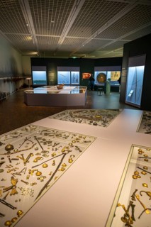 Exhibition room with ancient Roman utensils and showcases, Battle of Varus Roman Museum Kalkriese,