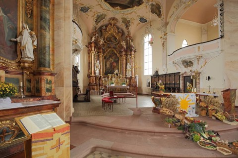 Thanksgiving in the magnificent baroque St. Martin church, chancel, figures, decorations, interior